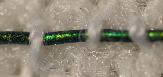 MIT Engineers Create Pressure-Responsive Smart Fibers That Change Color to Show Bandage Pressure Pressure-sensitive fiber